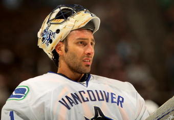 DENVER - OCTOBER 03:  Goaltender Roberto Luongo #1 of the Vancouver Canucks looks on during a break in the action against the Colorado Avalanche during NHL action at the Pepsi Center on October 3, 2009 in Denver, Colorado. Luongo had 24 saves while giving up three goals as the Avalanche defeated the Canucks 3-0.  (Photo by Doug Pensinger/Getty Images)