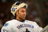 DENVER - OCTOBER 03:  Goaltender Roberto Luongo #1 of the Vancouver Canucks looks on during a break in the action against the Colorado Avalanche during NHL action at the Pepsi Center on October 3, 2009 in Denver, Colorado. Luongo had 24 saves while giving up three goals as the Avalanche defeated the Canucks 3-0.  (Photo by Doug Pensinger/Getty Images)