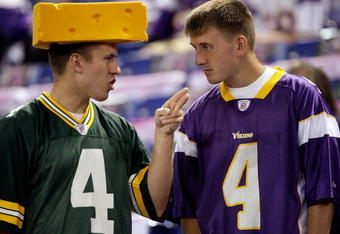 MINNEAPOLIS - OCTOBER 05:  Fans of Brett Favre #4  of the Minnesota Vikings talk prior to the start of the game against of the Green Bay Packers on October 5, 2009 at Hubert H. Humphrey Metrodome in Minneapolis, Minnesota.  (Photo by Jamie Squire/Getty Images)