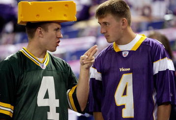 MINNEAPOLIS - OCTOBER 05:  Fans of Brett Favre #4  of the Minnesota Vikings talk prior to the start of the game against of the Green Bay Packers on October 5, 2009 at Hubert H. Humphrey Metrodome in Minneapolis, Minnesota.  (Photo by Jamie Squire/Getty Images)