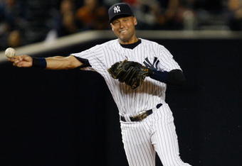 NEW YORK - SEPTEMBER 29:  Derek Jeter #2 of the New York Yankees throws for the out at first base against the Kansas City Royals during the game on September 29, 2009 at Yankee Stadium in the Bronx borough of New York City.  (Photo by Jared Wickerham/Getty Images)