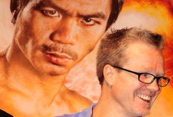 BEVERLY HILLS, CA - SEPTEMBER 14: Freddy Roach jokes with boxer Manny Pacquiao during the press conference at the Beverly Hills Hotel  on September 14, 2009 in Beverly Hills, California.  (Photo by Jacob de Golish/Getty Images)