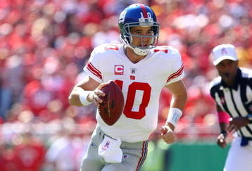 KANSAS CITY, MO - OCTOBER 04:  Quarterback Eli Manning #10 of the New York Giants scrambles during the game against the Kansas City Chiefs on October 4, 2009 at Arrowhead Stadium in Kansas City, Missouri.  (Photo by Jamie Squire/Getty Images)