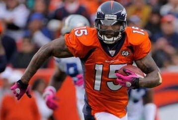 DENVER - OCTOBER 04:  Brandon Marshall #15 of the Denver Broncos makes a reception against the Dallas Cowboys during NFL action at Invesco Field at Mile High on October 4, 2009 in Denver, Colorado. The Broncos defeated the Cowboys 17-10.  (Photo by Doug Pensinger/Getty Images)