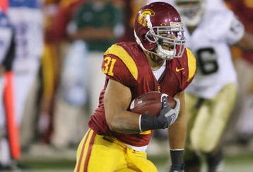 LOS ANGELES - NOVEMBER 29:  Stanley Havili #31 of the USC Trojans carries the ball against the Notre Dame Fighting Irish on November 29, 2008 at the Los Angeles Memorial Coliseum in Los Angeles, California.  USC won 38-3.  (Photo by Jeff Golden/Getty Images)