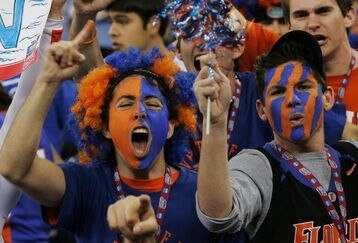 INDIANAPOLIS - APRIL 03:  Florida Gators fans cheer their team on before the start of the National Championship game against the UCLA Bruins of the NCAA Men's Final Four on April 3, 2006 at the RCA Dome in Indianapolis, Indiana.  (Photo by Win McNamee/Getty Images)