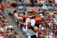 CLEVELAND - OCTOBER 04:  Carson Palmer #9 of the Cincinnati Bengals throws a pass against the Cleveland Browns during their game at Cleveland Browns Stadium on October 4, 2009 in Cleveland, Ohio. The Bengals defeated the Browns 23-20 in overtime.  (Photo by Jim McIsaac/Getty Images)