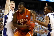 GREENSBORO, NC - MARCH 21:  Damion James #5 of the Texas Longhorns drives between Kyle Singler #12 and Nolan Smith #2 of the Duke Blue Devils during the second round of the NCAA Division I Men's Basketball Tournament at the Greensboro Coliseum on March 21, 2009 in Greensboro, North Carolina.  (Photo by Streeter Lecka/Getty Images)