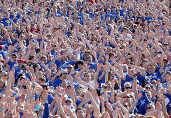 LAWRENCE, KS - SEPTEMBER 19:  Students of the Kansas Jayhawks cheer in the stands during the game against the Duke Blue Devils on Kivisto Field at Memorial Stadium on September 19, 2009 in Lawrence, Kansas. (Photo by Jamie Squire/Getty Images)