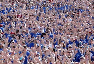 LAWRENCE, KS - SEPTEMBER 19:  Students of the Kansas Jayhawks cheer in the stands during the game against the Duke Blue Devils on Kivisto Field at Memorial Stadium on September 19, 2009 in Lawrence, Kansas. (Photo by Jamie Squire/Getty Images)