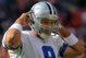 DENVER - OCTOBER 04: Quarterback Tony Romo #9 of the Dallas Cowboys walks to the bench after failing to convert a third down against the Denver Broncos during NFL action at Invesco Field at Mile High on October 4, 2009 in Denver, Colorado. The Broncos defeated the Cowboys 17-10. (Photo by Doug Pensinger/Getty Images)