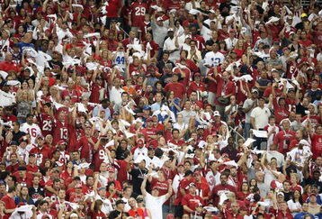 GLENDALE, AZ - SEPTEMBER 27:  Fans for the Arizona Cardinals cheer during the NFL game against the Indianapolis Colts at the Universtity of Phoenix Stadium on September 27, 2009 in Glendale, Arizona.  The Colts defeated the Cardinals 31-10.  (Photo by Christian Petersen/Getty Images)