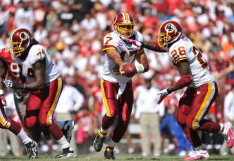 LANDOVER, MD - OCTOBER 4:  Jason Campbell #17 of the Washington Redskins hands off against the Tampa Bay Buccaneers at FedExField on October 4, 2009 in Landover, Maryland. The Redskins defeated the Buccaneers 16-13. (Photo by Larry French/Getty Images)