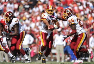LANDOVER, MD - OCTOBER 4:  Jason Campbell #17 of the Washington Redskins hands off against the Tampa Bay Buccaneers at FedExField on October 4, 2009 in Landover, Maryland. The Redskins defeated the Buccaneers 16-13. (Photo by Larry French/Getty Images)