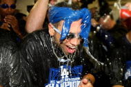 LOS ANGELES, CA - OCTOBER 03: James Loney #7 (R) of the Los Angeles Dodgers is doused with champagne as they celebrate after the game with the Colorado Rockies on October 3, 2009 at Dodger Stadium in Los Angeles, California. The Dodgers won 5-0 to clinch the National League West. (Photo by Stephen Dunn/Getty Images)