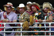 LANDOVER, MD - SEPTEMBER 28: The Hogettes cheer on the Redskins during a game between the New England Patriots and the Washington Redskins on September 28, 2003 at FedEx Field in Landover, Maryland. The Redskins defeated the Patriots 20-17. (Photo by Jamie Squire/Getty Images).