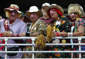 LANDOVER, MD - SEPTEMBER 28:  The Hogettes cheer on the Redskins during a game between the New England Patriots and the Washington Redskins on September 28, 2003 at FedEx Field in Landover, Maryland. The Redskins defeated the Patriots 20-17. (Photo by Jamie Squire/Getty Images). 