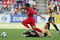 ADELAIDE, AUSTRALIA - OCTOBER 05:  Cassio of United is tackled by Labinot Haliti of the Jets during the round nine A-League match between Adelaide united and the Newcastle Jets at Hindmarsh Stadium on October 5, 2009 in Adelaide, Australia.  (Photo by James Knowler/Getty Images)