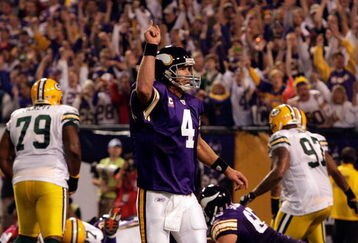 MINNEAPOLIS - OCTOBER 05:  Quarterback Brett Favre #4 of the Minnesota Vikings celebrates after a touchdown during the game against the Green Bay Packers on October 5, 2009 at Hubert H. Humphrey Metrodome in Minneapolis, Minnesota.  (Photo by Jamie Squire/Getty Images)