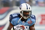 NASHVILLE, TN - SEPTEMBER 3: Kenny Britt #18 of the Tennessee Titans runs with the ball in warmups against the Green Bay Packers during a preseason NFL game at LP Field on September 3, 2009 in Nashville, Tennessee. The Titans beat the Packers 27-13. (Photo by Joe Murphy/Getty Images) 