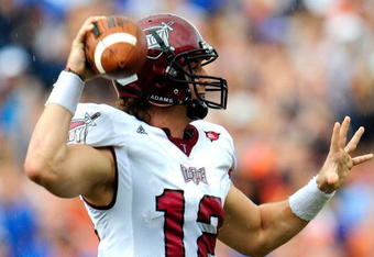 GAINESVILLE, FL - SEPTEMBER 12:  Levi Brown #12 of the Troy Trojans attempts a pass during the game against the Florida Gators at Ben Hill Griffin Stadium on September 12, 2009 in Gainesville, Florida.  (Photo by Sam Greenwood/Getty Images)