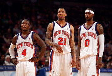 NEW YORK - MARCH 07: Nate Robinson #4, Wilson Chandler #21 and Larry Hughes #0 of the New York Knicks watch a free throw against the Charlotte Bobcats on March 7, 2009 at Madison Square Garden in New York City. NOTE TO USER: User expressly acknowledges and agrees that, by downloading and or using this photograph, User is consenting to the terms and conditions of the Getty Images License Agreement.  (Photo by Nick Laham/Getty Images)