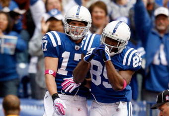 INDIANAPOLIS - OCTOBER 04:  Pierre Garcon #85 of the Indianapolis Colts and Autin Collie #17 celebrate a touchdown reception by Collie during the NFL game against the Seattle Seahawks at Lucas Oil Stadium on October 4, 2009 in Indianapolis, Indiana. The Colts won 34-17. Many players and officials in the NFL wore pink as part of breast cancer awareness month.  (Photo by Andy Lyons/Getty Images)
