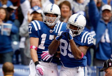 INDIANAPOLIS - OCTOBER 04:  Pierre Garcon #85 of the Indianapolis Colts and Autin Collie #17 celebrate a touchdown reception by Collie during the NFL game against the Seattle Seahawks at Lucas Oil Stadium on October 4, 2009 in Indianapolis, Indiana. The Colts won 34-17. Many players and officials in the NFL wore pink as part of breast cancer awareness month.  (Photo by Andy Lyons/Getty Images)