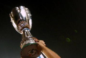 BEIJING - AUGUST 08:  Tommaso Rocchi captain of Lazio celebrates victory with the cup after the Beijing 2009 Supercup match between Inter Milan and Lazio at the Birds Nest on August 8, 2009 in Beijing, China.  (Photo by Feng Li/Getty Images)