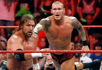 LAS VEGAS - AUGUST 24:  Wrestlers Triple H (L) and Randy Orton compete during the WWE Monday Night Raw show at the Thomas & Mack Center August 24, 2009 in Las Vegas, Nevada.  (Photo by Ethan Miller/Getty Images)