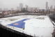 CHICAGO, IL - APRIL 7:  Workmen from the Wrigley Field grounds crew shovel snow from the infield of the park in Chicago, Illinois April 7, 2003. The Chicago Cubs were to play their home opener against the Montreal Expos today but the game was cancelled due to the snow. (Photo by Scott Olson/Getty Images)