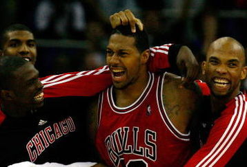LONDON, ENGLAND - OCTOBER 06:  James Johnson (C) of the Chicago Bulls celebrates with team mates after scoring the winning shot in the final second during the NBA pre-season game as part of the 2009 NBA Europe Live Tour between Chicago Bulls and Utah Jazz at the O2 Arena on October 6, 2009 in London, England.  NOTE TO USER: User expressly acknowledges and agrees that, by downloading and/or using this Photograph, user is consenting to the terms and conditions of the Getty Images License Agreement.  (Photo by Clive Rose/Getty Images)