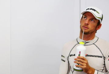 SUZUKA, JAPAN - OCTOBER 02:  Jenson Button of Great Britain and Brawn GP prepares to drive during practice for the Japanese Formula One Grand Prix at Suzuka Circuit on October 2, 2009 in Suzuka, Japan.  (Photo by Mark Thompson/Getty Images)