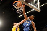 LOS ANGELES, CA - JANUARY 22:  Nick Young #1 of the Washington Wizards dunks against Vladimir Radmanovic #10 of the Los Angeles Lakers during the fourth quarter at the Staples Center January 22, 2009 in Los Angeles, California. NOTE TO USER: User expressly acknowledges and agrees that, by downloading and/or using this Photograph, user is consenting to the terms and conditions of the Getty Images License Agreement.  (Photo by Kevork Djansezian/Getty Images)