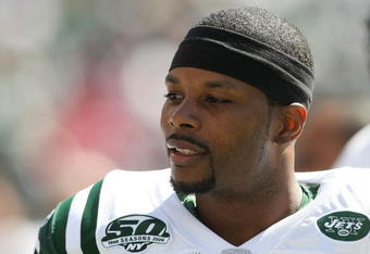EAST RUTHERFORD, NJ - SEPTEMBER 20: Kerry Rhodes #25  of the New York Jets in the sideline against the New England Patriots at Giants Stadium on September 20, 2009 in East Rutherford, New Jersey.  (Photo by Nick Laham/Getty Images)