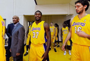 EL SEGUNDO, CA - SEPTEMBER 29:  Ron Artest #37and Pau Gasol #16 of the Los Angeles Lakers arrive Lakers media day at the team's training facility on September 29, 2009 in El Segundo, California.  NOTE TO USER: User expressly acknowledges and agrees that, by downloading and/or using this Photograph, user is consenting to the terms and conditions of the Getty Images License Agreement.  (Photo by Kevork Djansezian/Getty Images)