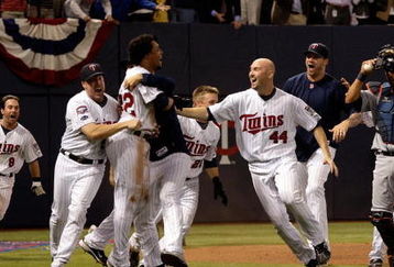 MINNEAPOLIS - OCTOBER 06:  The Minnesota Twins celebrate after defeating the Detroit Tigers during the American League Tiebreaker game on October 6, 2009 at Hubert H. Humphrey Metrodome in Minneapolis, Minnesota.  (Photo by Jamie Squire/Getty Images)