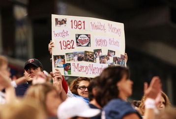 MINNEAPOLIS, MN - OCTOBER 4: A Minnesota Twins fan holds a sign sharing her memories of the Hubert H. Humphrey Metrodome before the start of the Minnesota Twins' game against the Kansas City Royals on October 4, 2009 in Minneapolis, Minnesota. This will be the last regular season game at the Dome for the Twins. (Photo by Genevieve Ross/Getty Images)