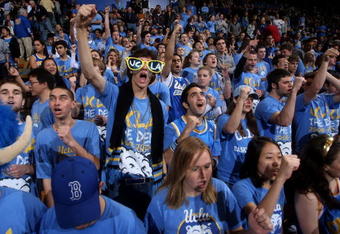 WESTWOOD, CA - FEBRUARY 7:   Members of the UCLA Bruins student section cheer before the game with the Notre Dame Fighting Irish on February 7, 2009 at Pauley Pavillion in Westwood, California.  UCLA won 89-63.   (Photo by Stephen Dunn/Getty Images)
