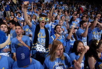 WESTWOOD, CA - FEBRUARY 7:   Members of the UCLA Bruins student section cheer before the game with the Notre Dame Fighting Irish on February 7, 2009 at Pauley Pavillion in Westwood, California.  UCLA won 89-63.   (Photo by Stephen Dunn/Getty Images)
