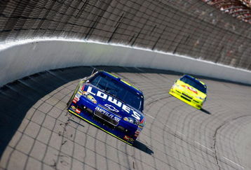 BROOKLYN, MI - AUGUST 16:  Jimmie Johnson, driver of the #48 Lowe's Chevrolet races Mark Martin, driver of the #5 Kellogg's/CARQUEST Chevrolet during the NASCAR Sprint Cup Series CARFAX 400 at Michigan International Speedway on August 16, 2009 in Brooklyn, Michigan.  (Photo by Jason Smith/Getty Images)