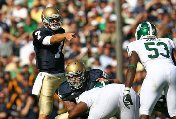 SOUTH BEND, IN - SEPTEMBER 19: Jimmy Clausen #7 of the Notre Dame Fighting Irish points out a defensive alingment including Greg Jones #53 of the Michigan State Spartans on September 19, 2009 at Notre Dame Stadium in South Bend, Indiana. Notre Dame defeated Michigan State 33-30. (Photo by Jonathan Daniel/Getty Images)