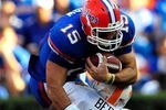 GAINESVILLE, FL - SEPTEMBER 19:  Tim Tebow #15 of the Florida Gators is tackled by Eric Berry #14 of the Tennessee Volunteers during the game at Ben Hill Griffin Stadium on September 19, 2009 in Gainesville, Florida.  (Photo by Sam Greenwood/Getty Images)