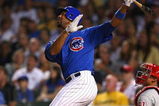 CHICAGO - AUGUST 12: Derrek Lee #25 of the Chicago Cubs hits a fly ball against the Philadelphia Phillies on August 12, 2009 at Wrigley Field in Chicago, Illinois. The Phillies defeated the Cubs 12-5. (Photo by Jonathan Daniel/Getty Images) 