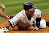 NEW YORK - SEPTEMBER 26:  Derek Jeter #2 of the New York Yankees avoids a pick off against the Boston Red Sox on September 26, 2009 at Yankee Stadium in the Bronx borough of New York City.  (Photo by Jim McIsaac/Getty Images)