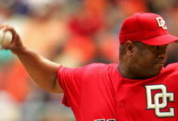 WASHINGTON ? APRIL 13:  Pitcher Livan Hernandez #61 of the Washington Nationals delivers a pitch against the New York Mets on April 13, 2006 at RFK Stadium in Washington, DC.  The Mets won 13-4.  (Photo by Jamie Squire/Getty Images) 