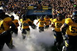 BERKELEY, CA - OCTOBER 03:  The California Golden Bears enter the stadium before their game against the USC Trojans at California Memorial Stadium on October 3, 2009 in Berkeley, California.  (Photo by Ezra Shaw/Getty Images)