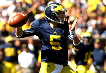ANN ARBOR, MI - SEPTEMBER 19:  Quarterback Tate Forcier #5 of the Michigan Wolverines throws a pass against the Eastern Michigan Eagles at Michigan Stadium on September 19, 2009 in Ann Arbor, Michigan.   Michigan won 45-17.  (Photo by Stephen Dunn/Getty Images)