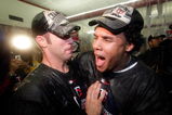 MINNEAPOLIS - OCTOBER 06:  Joe Mauer #7 of the Minnesota Twins ccelebrates with Carlos Gomez #22 in the locker room after the Twins defeated  the Detroit Tigers to win the American League Tiebreaker game on October 6, 2009 at Hubert H. Humphrey Metrodome in Minneapolis, Minnesota.  (Photo by Jamie Squire/Getty Images)