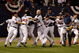 MINNEAPOLIS - OCTOBER 06:  The Minnesota Twins celebrate after defeating the Detroit Tigers during the American League Tiebreaker game on October 6, 2009 at Hubert H. Humphrey Metrodome in Minneapolis, Minnesota.  (Photo by Jamie Squire/Getty Images)